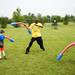 Pittsfield Pee Wee Olympics volunteer Michael Scott plays with kids in the jousting area on Sunday, June 9. Daniel Brenner I AnnArbor.com